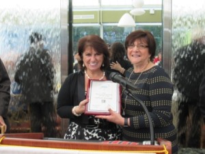 Realtor Associate of the Year Stephanie Rosenthal, left, accepts her award from Georgianna Diaz, a SIBOR past president.